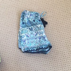 Size 10 blue patterned flowy shorts. Slightly used